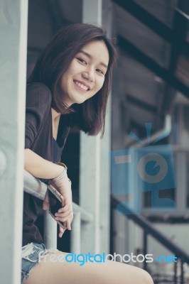 Portrait Of Thai Adult Beautiful Girl Relax And Smile Stock Photo