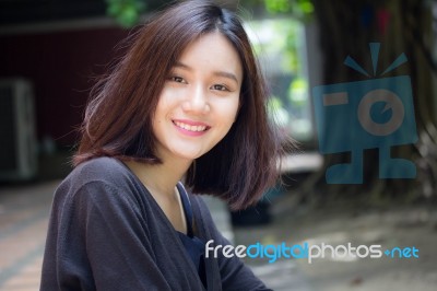 Portrait Of Thai Adult Beautiful Girl Relax And Smile Stock Photo