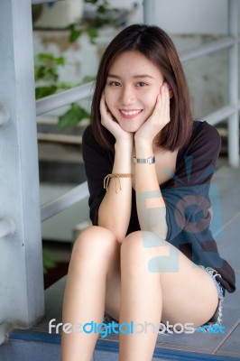 Portrait Of Thai Adult Beautiful Girl Relax And Smile Stock Photo