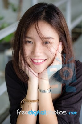 Portrait Of Thai Adult Beautiful Girl Relax And Smile Stock Photo