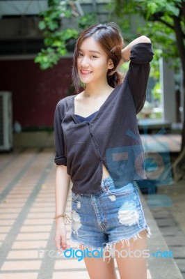 Portrait Of Thai Adult Beautiful Girl Relax And Smile Stock Photo