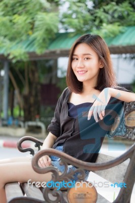 Portrait Of Thai Adult Beautiful Girl Relax And Smile Stock Photo