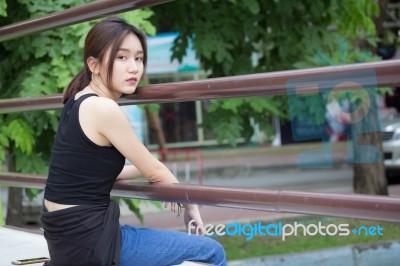 Portrait Of Thai Adult Beautiful Girl Relax And Smile Stock Photo