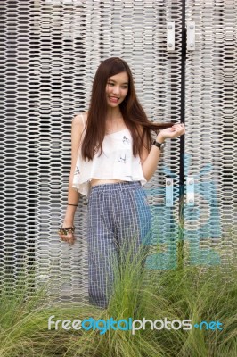 Portrait Of Thai Adult Beautiful Girl Relax And Smile Stock Photo