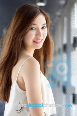 Portrait Of Thai Adult Beautiful Girl Relax And Smile Stock Photo