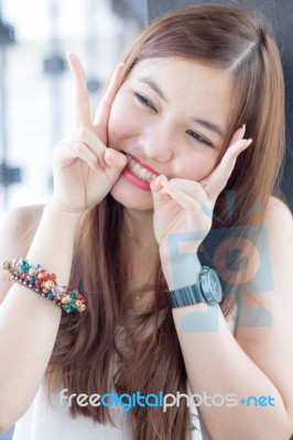 Portrait Of Thai Adult Beautiful Girl Relax And Smile Stock Photo