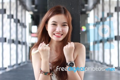 Portrait Of Thai Adult Beautiful Girl Relax And Smile Stock Photo