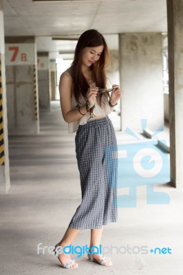 Portrait Of Thai Adult Beautiful Girl Relax And Smile Stock Photo