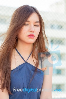 Portrait Of Thai Adult Beautiful Girl Relax And Smile Stock Photo