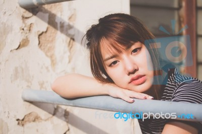 Portrait Of Thai Adult Beautiful Girl Relax And Smile Stock Photo