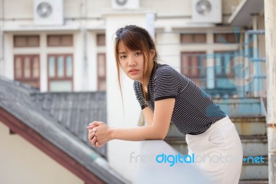 Portrait Of Thai Adult Beautiful Girl Relax And Smile Stock Photo