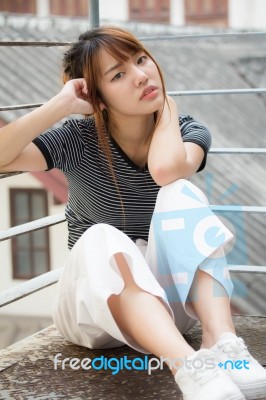 Portrait Of Thai Adult Beautiful Girl Relax And Smile Stock Photo