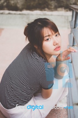 Portrait Of Thai Adult Beautiful Girl Relax And Smile Stock Photo