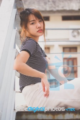 Portrait Of Thai Adult Beautiful Girl Relax And Smile Stock Photo