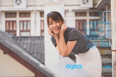 Portrait Of Thai Adult Beautiful Girl Relax And Smile Stock Photo