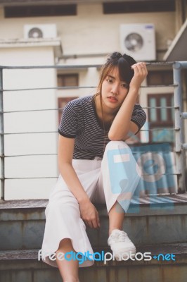 Portrait Of Thai Adult Beautiful Girl Relax And Smile Stock Photo