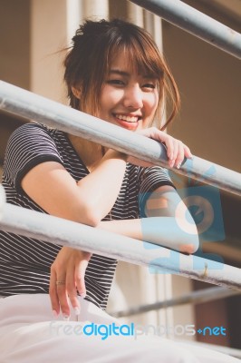 Portrait Of Thai Adult Beautiful Girl Relax And Smile Stock Photo