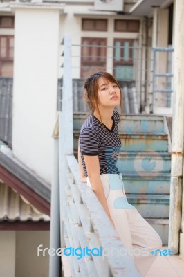 Portrait Of Thai Adult Beautiful Girl Relax And Smile Stock Photo