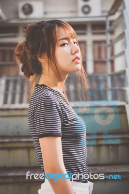 Portrait Of Thai Adult Beautiful Girl Relax And Smile Stock Photo