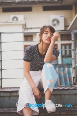 Portrait Of Thai Adult Beautiful Girl Relax And Smile Stock Photo