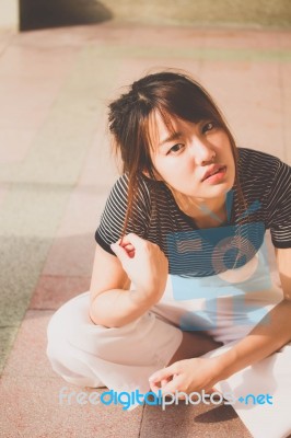 Portrait Of Thai Adult Beautiful Girl Relax And Smile Stock Photo