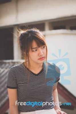 Portrait Of Thai Adult Beautiful Girl Relax And Smile Stock Photo