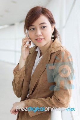 Portrait Of Thai Adult Businesswoman Beautiful Girl Calling Smart Phone Stock Photo