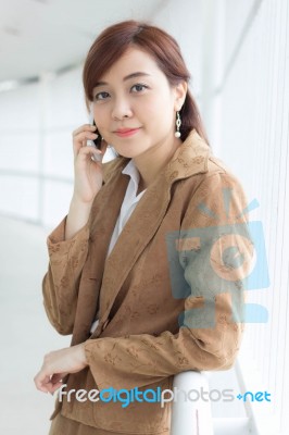 Portrait Of Thai Adult Businesswoman Beautiful Girl Calling Smart Phone Stock Photo