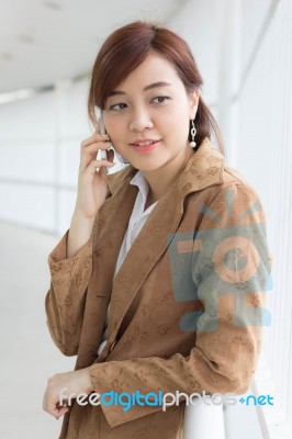 Portrait Of Thai Adult Businesswoman Beautiful Girl Calling Smart Phone Stock Photo