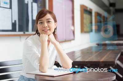 Portrait Of Thai Adult Businesswoman Beautiful Girl Read A Book Stock Photo