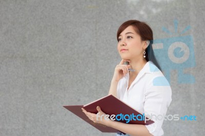 Portrait Of Thai Adult Businesswoman Beautiful Girl Read A Book Stock Photo