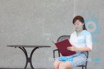 Portrait Of Thai Adult Businesswoman Beautiful Girl Read A Book Stock Photo