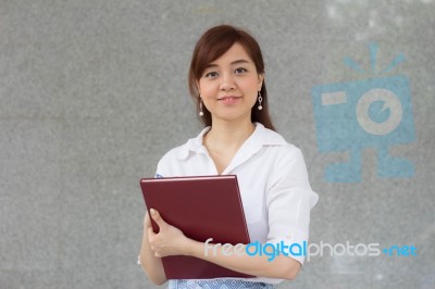 Portrait Of Thai Adult Businesswoman Beautiful Girl Read A Book Stock Photo