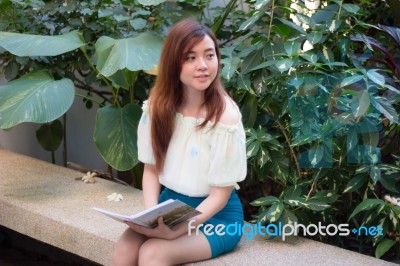 Portrait Of Thai Adult Businesswoman Beautiful Girl Read A Book Stock Photo