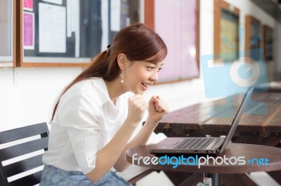 Portrait Of Thai Adult Businesswoman Beautiful Girl Using Computer Notebook Stock Photo