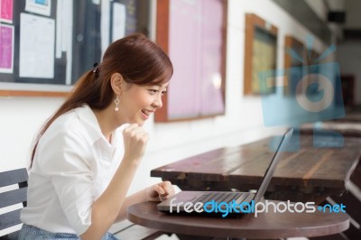 Portrait Of Thai Adult Businesswoman Beautiful Girl Using Computer Notebook Stock Photo