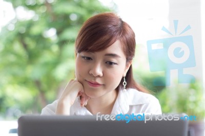 Portrait Of Thai Adult Businesswoman Beautiful Girl Using Computer Notebook Stock Photo