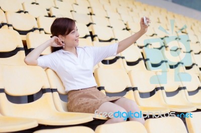 Portrait Of Thai Adult Businesswoman Beautiful Girl Using Her Smart Phone Selfie Stock Photo