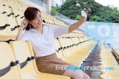 Portrait Of Thai Adult Businesswoman Beautiful Girl Using Her Smart Phone Selfie Stock Photo