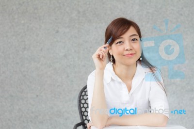 Portrait Of Thai Adult Businesswoman Beautiful Girl Write A Book… Stock Photo