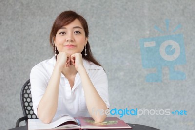 Portrait Of Thai Adult Businesswoman Beautiful Girl Write A Book… Stock Photo