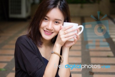 Portrait Of Thai Adult Glasses Beautiful Girl Drinking Coffee Stock Photo