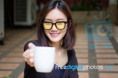 Portrait Of Thai Adult Glasses Beautiful Girl Drinking Coffee Stock Photo