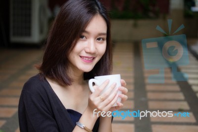 Portrait Of Thai Adult Glasses Beautiful Girl Drinking Coffee Stock Photo