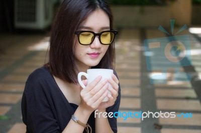 Portrait Of Thai Adult Glasses Beautiful Girl Drinking Coffee Stock Photo