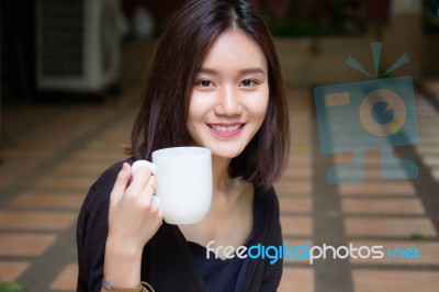 Portrait Of Thai Adult Glasses Beautiful Girl Drinking Coffee Stock Photo