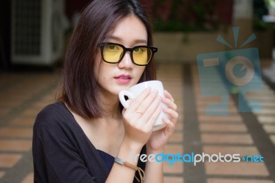 Portrait Of Thai Adult Glasses Beautiful Girl Drinking Coffee Stock Photo