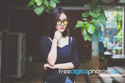 Portrait Of Thai Adult Glasses Beautiful Girl Relax And Smile Stock Photo