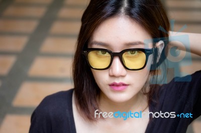 Portrait Of Thai Adult Glasses Beautiful Girl Relax And Smile Stock Photo