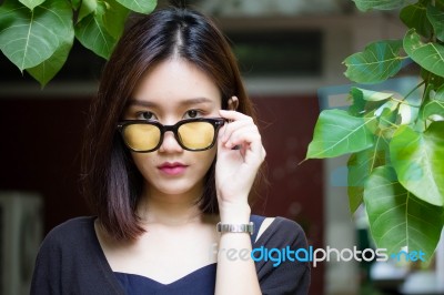 Portrait Of Thai Adult Glasses Beautiful Girl Relax And Smile Stock Photo